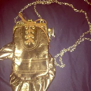 Gold boxing glove clutch